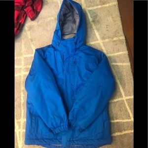 Heavy blue winter ski jacket